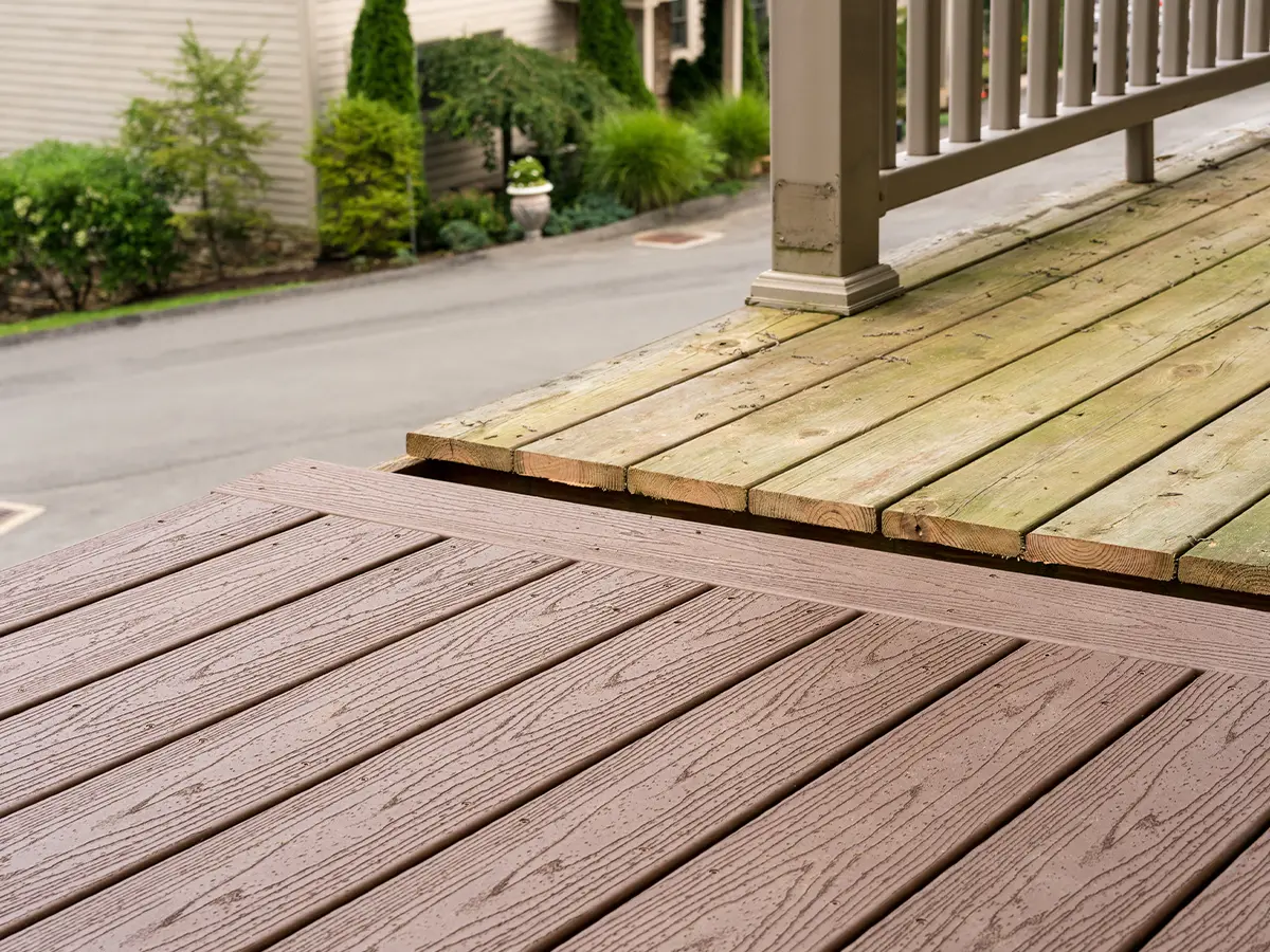 A deck split between pressure-treated wood and composite decking